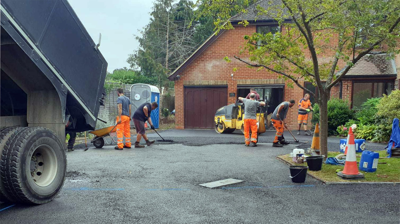 A tarmac path being hand laid in Beenham
