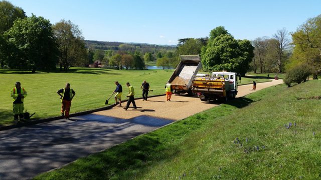 Surface dressing chip spreader lorry resrfacing a rural access road