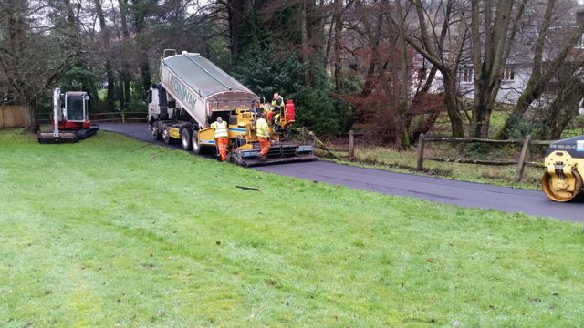 Asphalt Paver surfacing a private lane
